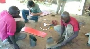Как африканские рабочие делают печи из старых бочек