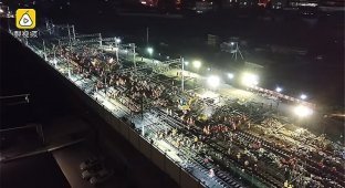 В Китае рабочие за ночь построили железную дорогу (6 фото + 1 видео)