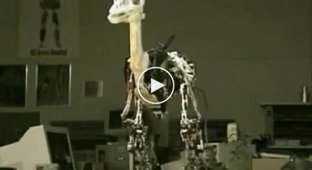 Робот динозавр