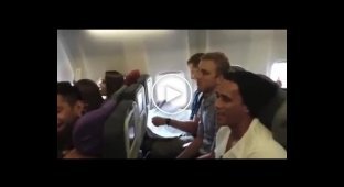 Исполнили песню на борту самолета