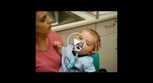 Реакция 8-ми месячного глухого малыша на слуховой аппарат