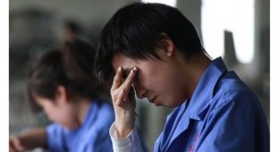 Все под контролем: китайские компании будут отслеживать эмоции сотрудников (2 фото)