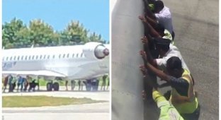 20 мужчин вручную толкают 35-тонный самолет (3 фото + 1 видео)