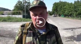 12 июля террористы обстреляли из града Петровский район Донецка
