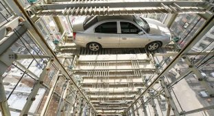 Умный 26-этажный гараж, самостоятельно размещающий автомобили (9 фото)