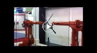 Демонстрация точности промышленных роботов с помощью катан