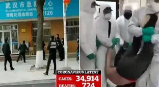 Больных коронавирусом в Китае отправляют в лагеря (39 фото)