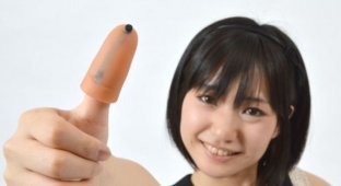 Решение проблемы коротких пальцев и больших экранов по-японски (7 фото)