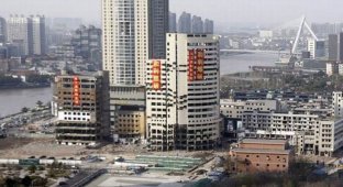 Снос зданий в Китае (8 фотографий)