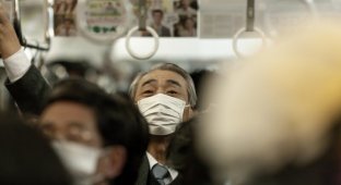 Почему в Азии многие носят маски? (3 фото)