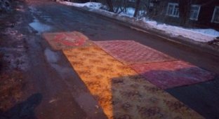 В Кирове ямы на дорогах накрыли коврами (6 фото)