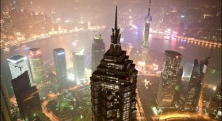 Строительство Шанхайского всемирного финансового центра (17 фото)