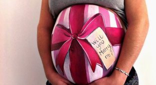 Оригинальное предложение руки и сердца и другие великолепные рисунки на животах беременных женщин (10 фото)