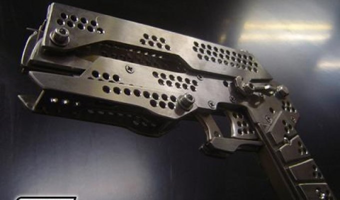 Пистолет для стрельбы резинками (6 фото)