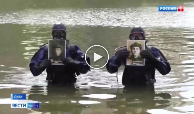 В Орле спасатели-водолазы прошли с портретами героев войны по дну реки