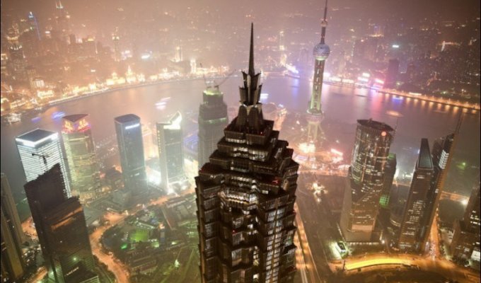 Строительство Шанхайского всемирного финансового центра (17 фото)
