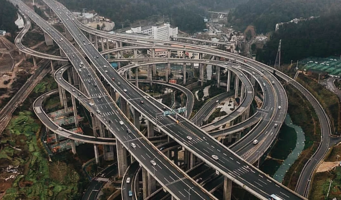 Как строят дороги в Китае (4 фото)