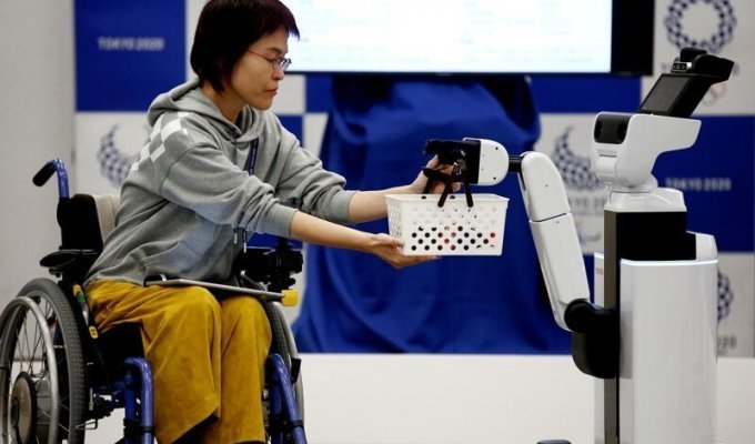 В Токио-2020 к олимпийцам приставят роботов (4 фото)