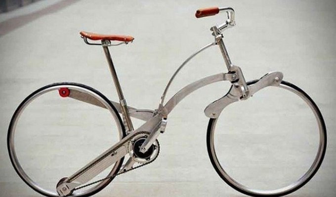 Суперкомпактный велосипед, который одним нажатием складывается до размеров зонтика (5 фото)