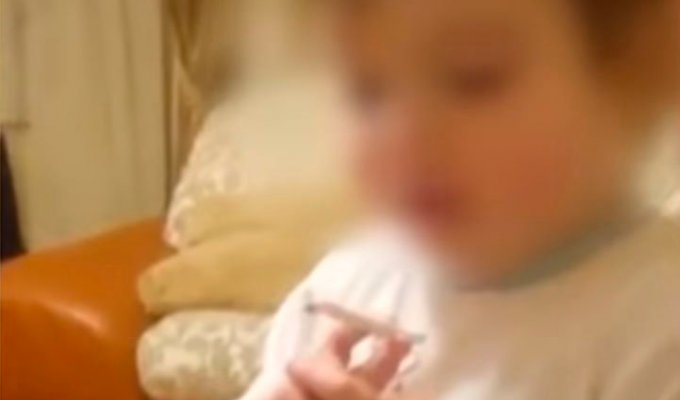 В сеть выложили видео с курящим и матерящимся дошкольником (3 фото + 1 видео)