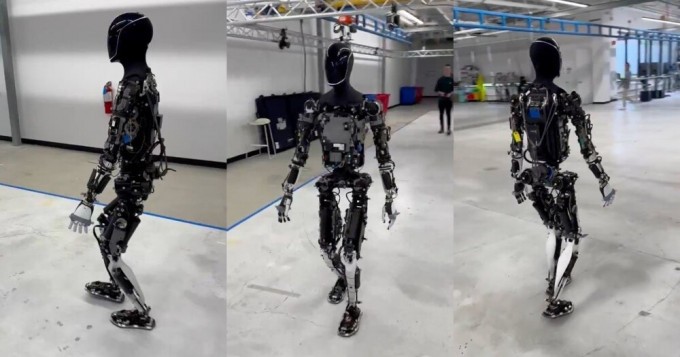 Илон Маск прогулялся с новым роботом по заводу Tesla (6 фото + 2 видео)