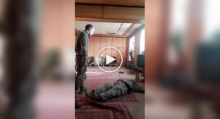 Russian commander beats his subordinates