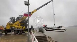 A boat raising operation in Chile didn't go according to plan