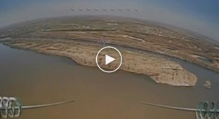 A kamikaze drone attacks an enemy attack drone in the sky over the Dnieper