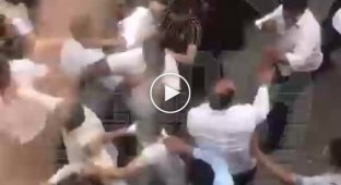 Fight over a spilled glass of champagne staged at a gypsy wedding