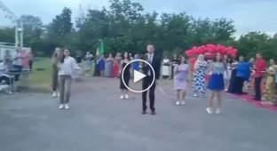 History teacher danced with girls at graduation