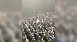 School condemned for holding a graduation ceremony in the pouring rain.