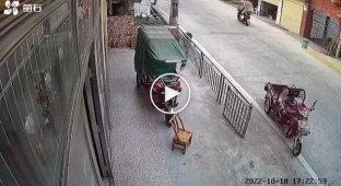 Young Chinese moped driver