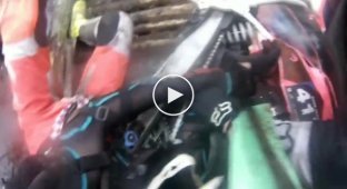 The racer's hand was caught between the wheel and the chain