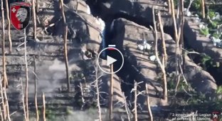 An occupier flies into the air after a direct hit from a Ukrainian shell into a trench