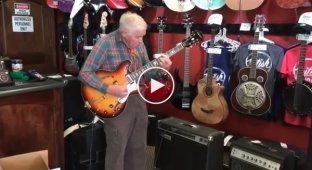 81-year-old grandfather checks guitar before buying