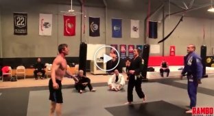 The owner of a black belt in jiu-jitsu and his student humiliate a muscleman