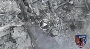 A Ukrainian drone drops grenades on Russian infantry near the village of Belogorivka in the Luhansk region