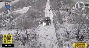 Russian tank disappears in flames after a drone attack