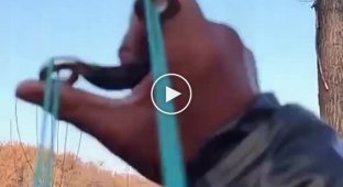 Sniper shoots with a slingshot