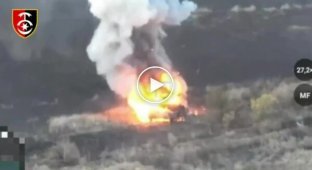 A dragon drone destroys a Russian tank-shed, which was immobilized after running over a Ukrainian mine