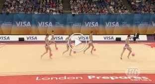 5 gymnasts lined up in a row. As soon as the music started, I couldn't take my eyes off