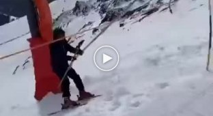 Skier on the ski lift and his failure