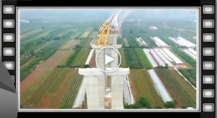 China. Construction of a huge bridge. Stunning and grandiose spectacle