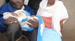 Самый уродливый человек Уганды стал отцом в восьмой раз и снял собственный клип (2 фото)