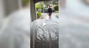 Guy prepares Corvette for hurricane with flood