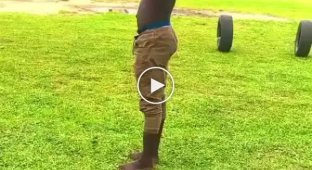 Cool acrobat shows off his skills in the backyard