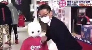 Робот-продавец будет напоминать японцам о масках (3 фото + 1 видео)