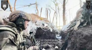 Soldiers of the 3rd Brigade clear enemy positions in the Kharkov region
