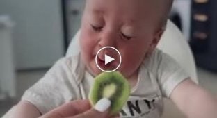 Funny baby reaction to the taste of kiwi