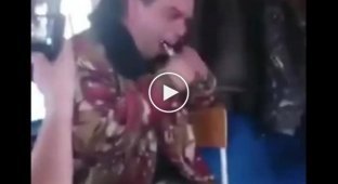 A man put a light bulb in his mouth